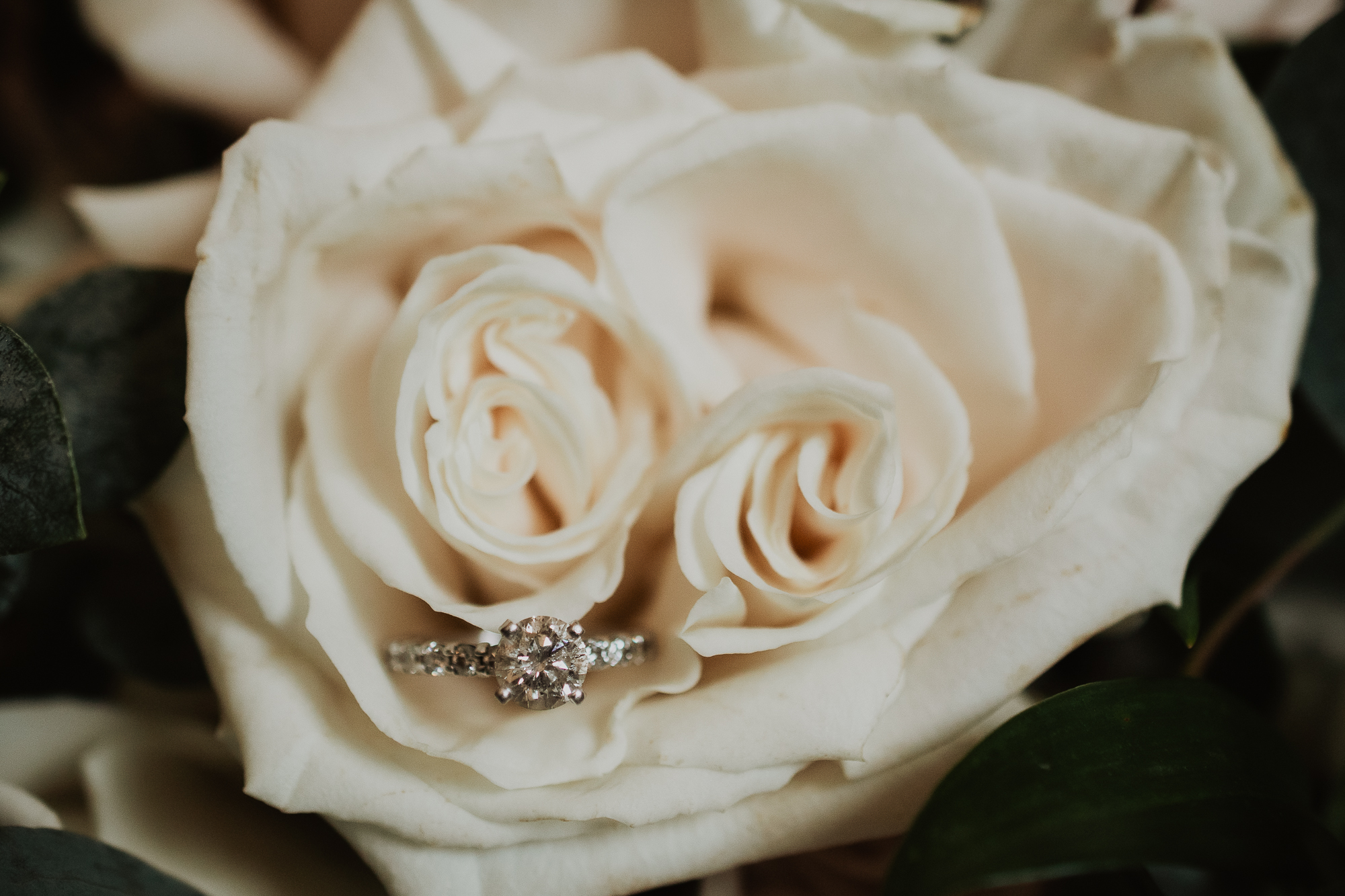 wedding ring on flowers