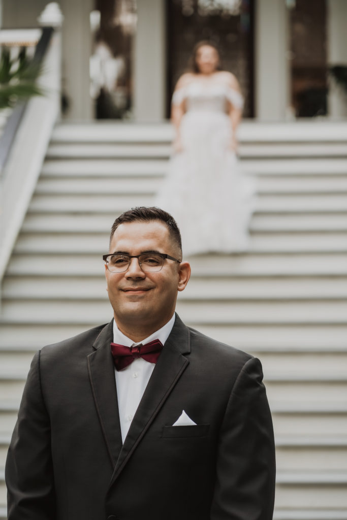 groom waiting on bride the Mackey house