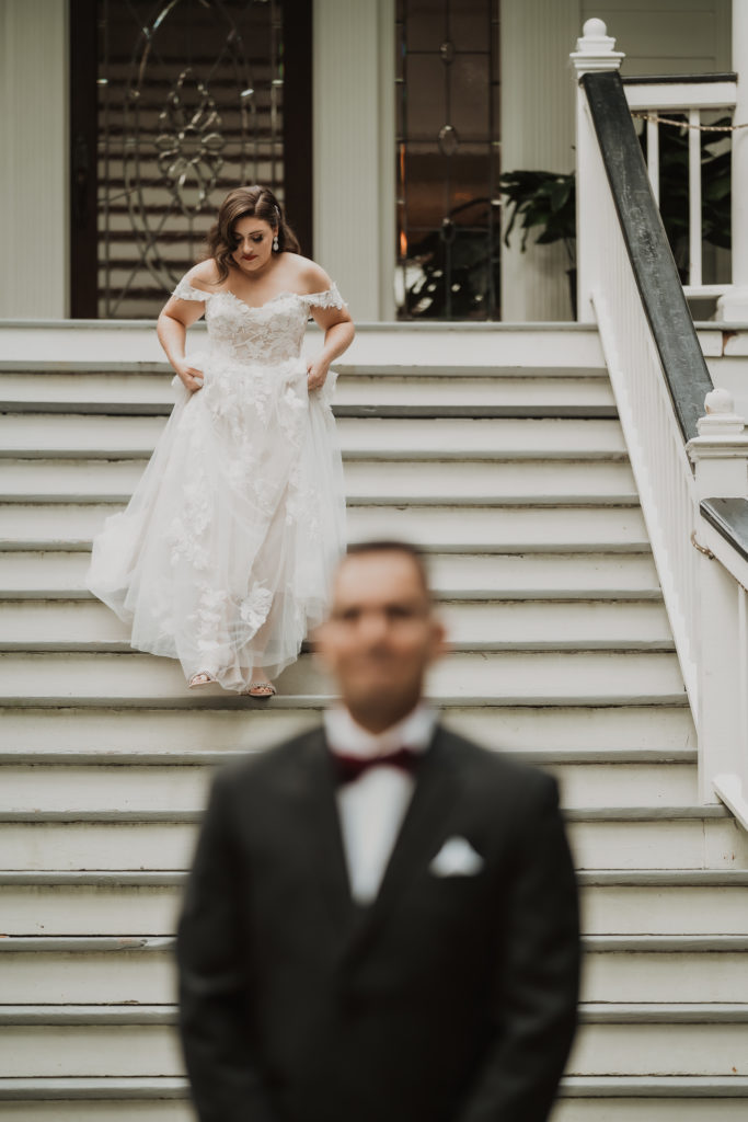 bride on stairs the Mackey house