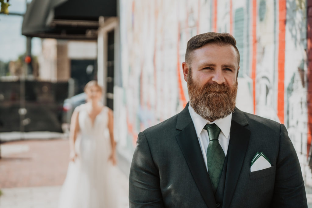 groom waiting on the bride