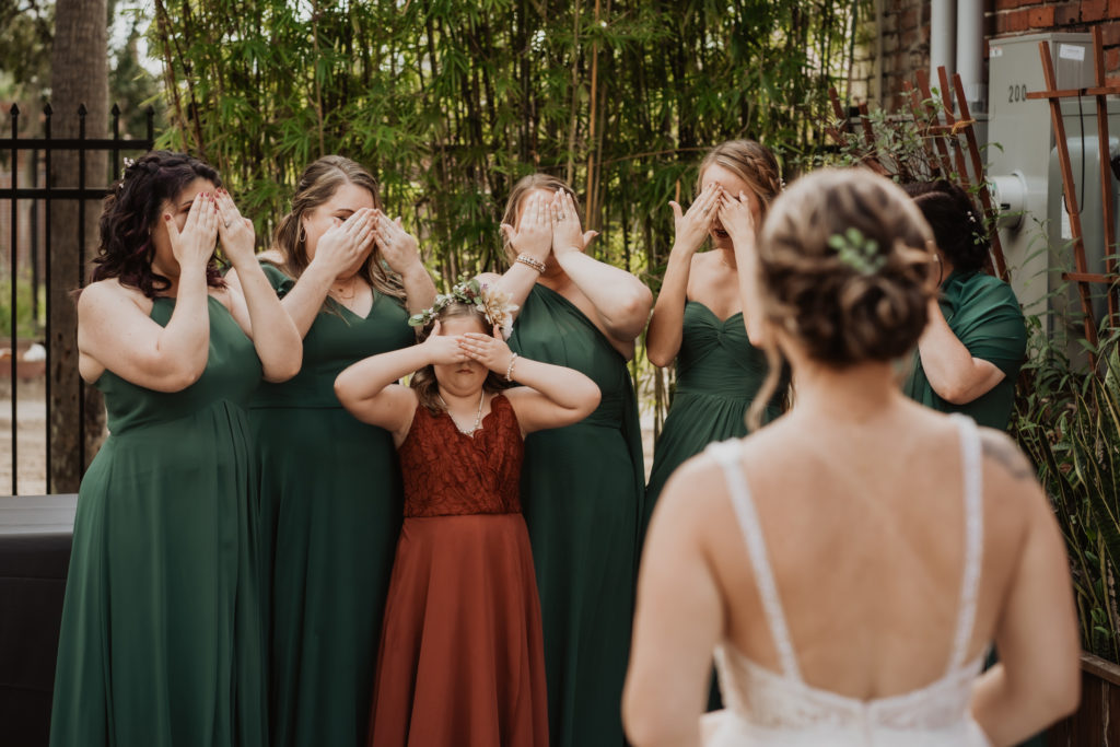 bridesmaids waiting to see the bride at brick and beam