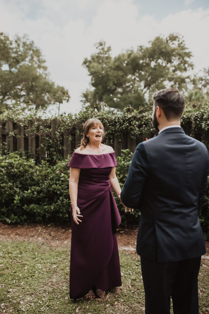 mom seeing groom for the first time at ever after farms