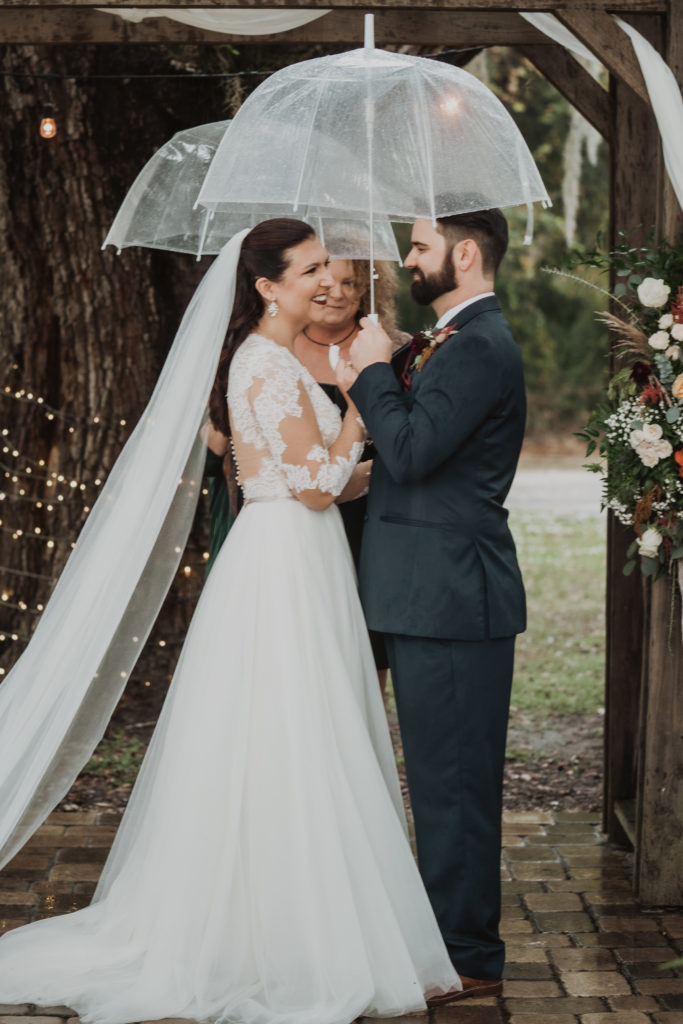 rainy Barn wedding at ever after farms in mims FL