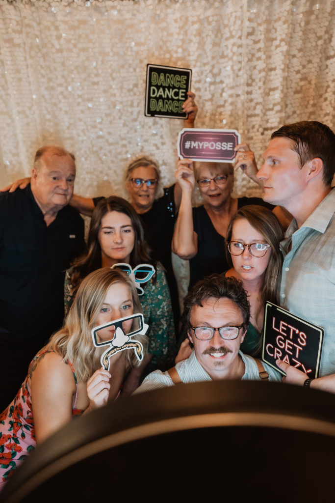 large group at wedding photo booth