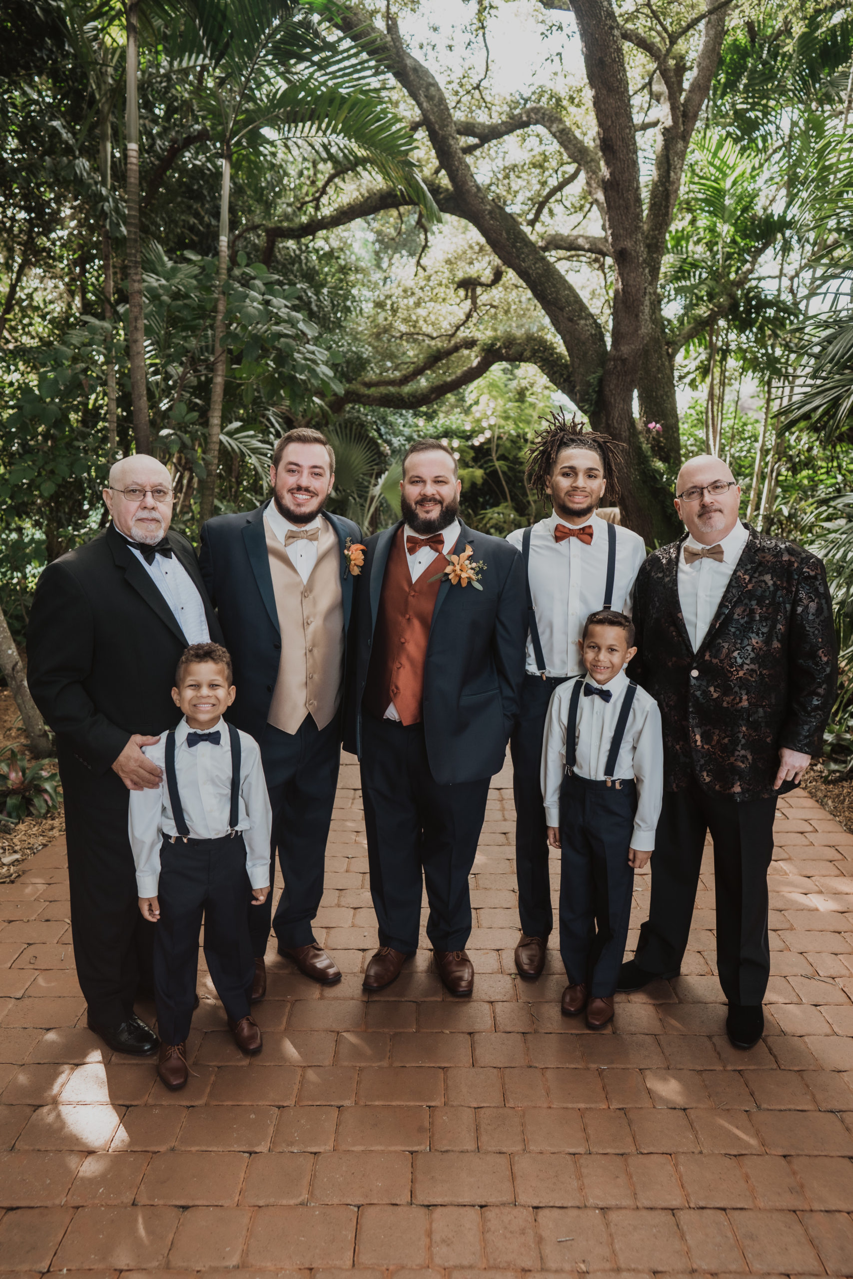 grooms with family